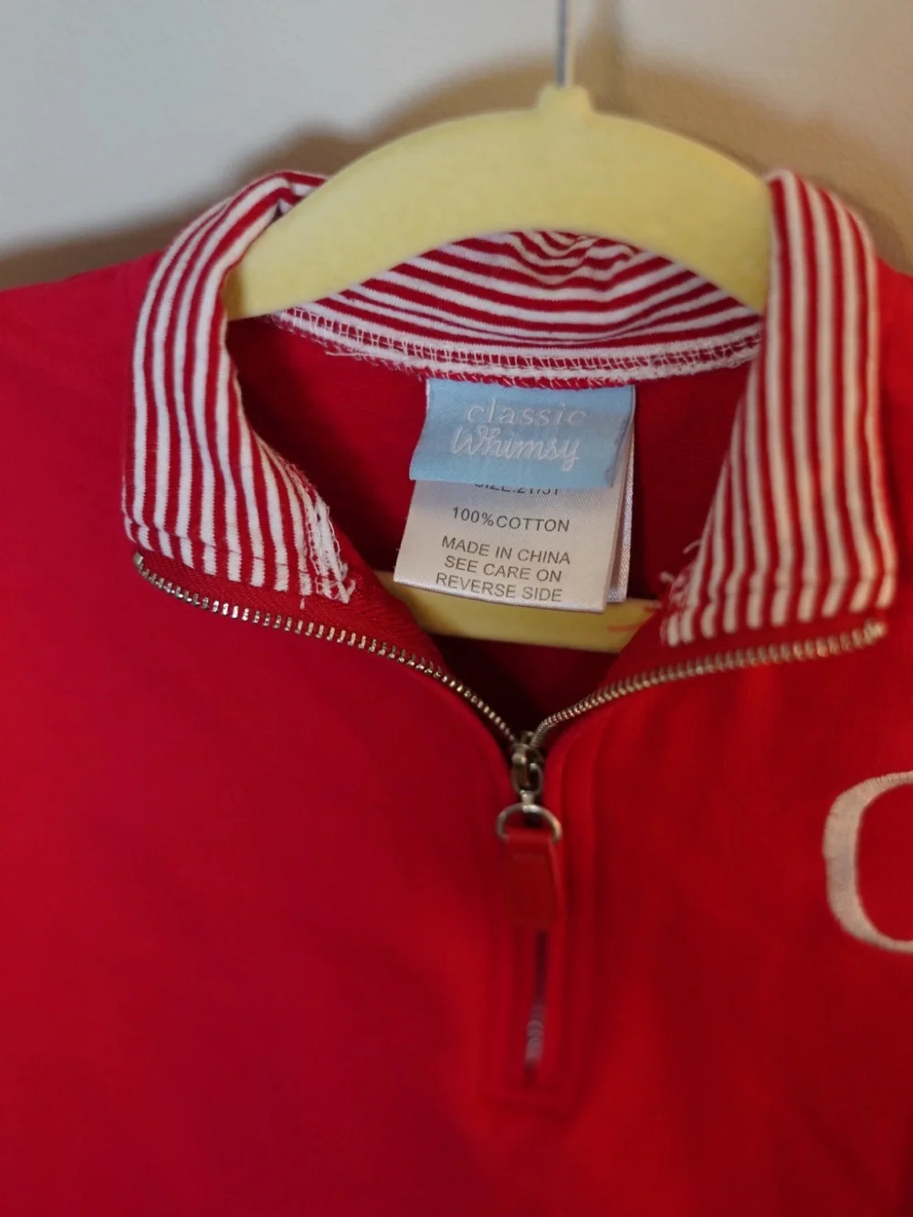 Classic Whimsy Red Quarter-Zip Top with Striped Collar and “C” monogram